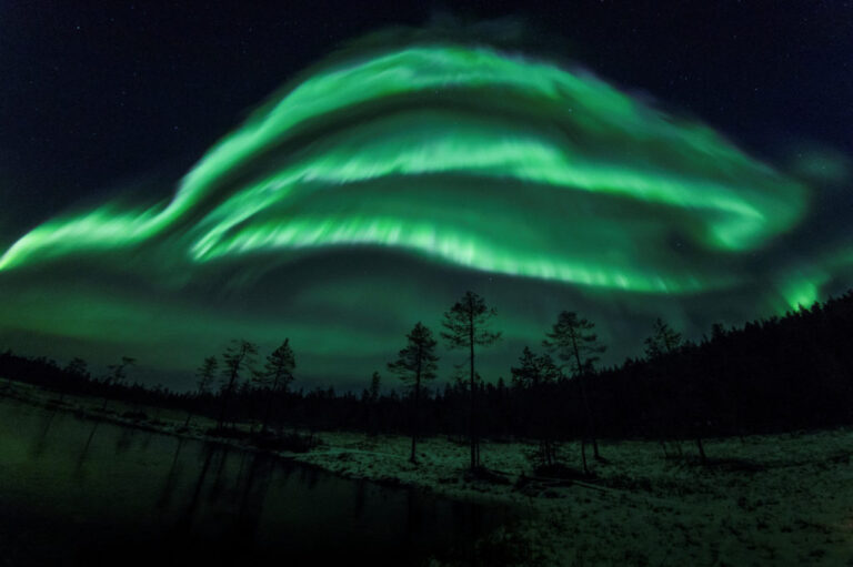 The Aurora Borealis (Northern Lights) is seen over the sky near Rovaniemi in Lapland